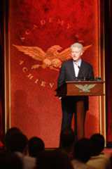 President Bill Clinton addresses his fellow Academy members and student delegates at the 2006 Summit.