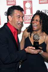 Brian Stokes Mitchell and actress Audra McDonald meet again during the 2004 Tony Awards. McDonald won Best Performance by a Featured Actress in a Play for <i>A Raisin in the Sun</i>. Mitchell and McDonald had previously appeared together in <i>Ragtime</i>. (© Andrew Kent/Corbis)