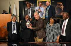  Wits Vice Chancellor, Adam Habib, Deputy President Cyril Ramaphosa and Professor Lee Berger reveal the discovery of a new species of human relative, Homo Naledia at The Cradle of Human Kind on September 10, 2015 at Maropeng in Johannesburg, South Africa. Naledi was discovered in a hard to reach chamber in the Rising Star Cave which has led scientists to believe that the Hominids had a understanding of the finality of death. Naledi stood about 1,5m high, had a unique mix of primitive and modern features with a tiny brain about the size of an orange, a slender body and unusually curved fingers. (Photo by Alon Skuy/The Times/Gallo Images/ Getty Images)