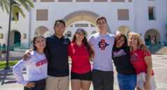 Group of students in from of Conrad Preby's Aztec Student Union.