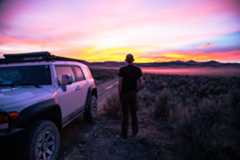 Pausing to watch a sunset along the Burner Byway in Nevada