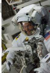 NASA astronaut Doug Wheelock, Expedition 24 flight engineer, attired in his Extravehicular Mobility Unit (EMU) spacesuit, is pictured in the Quest airlock of the International Space Station during preparations for the second of three planned...
