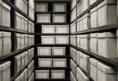 Boxes of files in an archive with labels