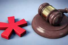 Das Foto zeigt einen Richterhammer und einen Genderstern.