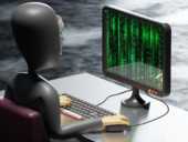 A computer hacker typing code for a cyber attack or data breach.