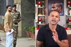 Suresh Raina and and (right) Shikhar Dhawan