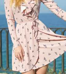 Woman wearing peach dress