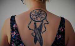 Woman with Tattoo on her Back
