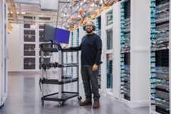a man standing in front of a store