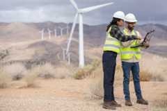 a man walking down a dirt road