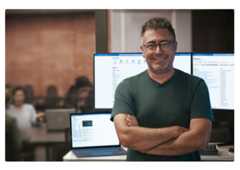 Man standing in front of computer