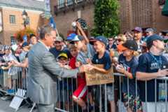A Hall of Famer signing autogrpahs outside of the Museum