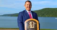 Jim Thome holds his Hall of Fame plaque