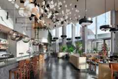 Lobby area, showcasing artwork and balcony  