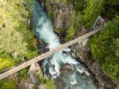Suspension bridge over river gorge