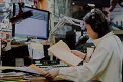 A student works in the WUTK radio station