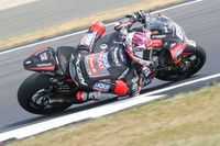 Swearing, shoeys and rising stars: Moto2 British GP podium had it all