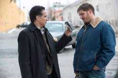 John Ortiz as ÒDetective TorresÓ and Tom Hardy as ÒBobÓ in THE DROP.   Photo by Barry Wetcher.   Copyright © 2014 Twentieth Century Fox.