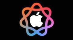 黒背景の中央に白いAppleロゴが配置され、その周囲をオレンジからピンク、ブルーへとグラデーションするループ状のラインが“∞(無限)”のような形で取り囲んでいるApple Intelligenceのイメージ