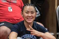 Yan Xiaonan poses backstage in Abu Dhabi