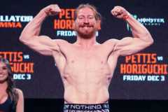 Spike Carlyle poses after making weight ahead of Bellator 272