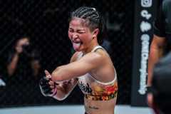 Stamp Fairtex sticks her tongue out