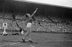 Charlotte 'Lotte' Haidegger throws Discus to win Gold at the 1949 Summer International University Sports Week. ©Topical Press Agency/Getty Images