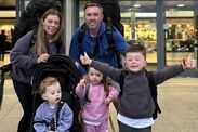 The family on their way at Heathrow