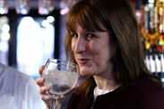 Rachel Reeves smirks as she drinks gin and tonic