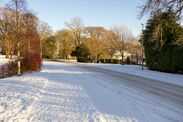 Snow covered streets after heavy snow on a sunny day.Scotland.