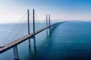 Panoramic aerial view of the Oresundsbron bridge between Denmark and Sweden. Oresund Bridge view at sunset.