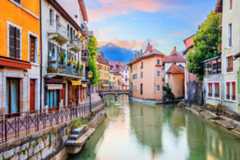 Annecy, Haute Savoie, France. The castle on an island (Palais de l'Isle) and Thiou river.