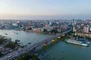 Aerial View of Babu Bazar Buriganga Bridge in Dhaka, Bangladesh - Iconic Urban Infrastructure. Dhaka City Skyline