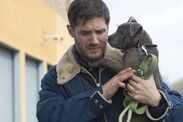 tom hardy holding a puppy The Drop