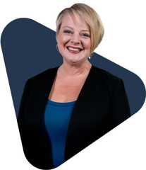 Julianna jung, educator, smiling in a blazer