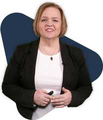 Educators triangle rhonda Rhonda, an educator, smiles in a black blazer holding an object.