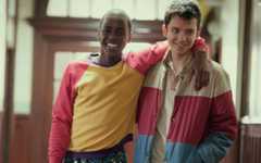 Ncuti Gatwa and Asa Butterfield share a smiling and relaxed moment in Sex Education