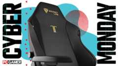 A close-up image of a gaming chair against a colorful background, with a set of Cyber Monday and PC Gamer logos on either side
