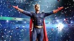 Antony Starr as Homelander on stage with his arm's stretched out during The Boys season 4.