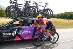 Chantal van den Broek-Blaak (SDWorx) receives treatment from her team after crashing on stage five of the 2022 Tour de France Femmes