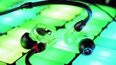 Sennheiser in ear monitors on a lit up dj controller