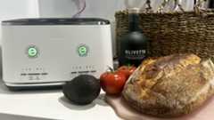 Breville Eye Q Auto toaster with sourdough loaf, tomato, olive oil and avocado in background
