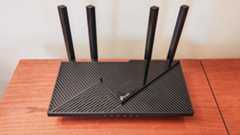 TP- Link Archer AX55 sitting on desk