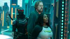 Vigilante (Freddie Stroma), John Economos (Steve Agee) and Adebayo (Danielle Brooks) in the Quantum Unfolding Chamber in Peacemaker season 2.