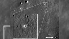 A view of the new moon crater with a box showing an enlarged version.