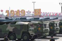 Military vehicles carrying DF-17 missiles parade through Tiananmen Square in Beijing on Oct. 1, 2019, celebrating the 70th anniversary of the founding of the Peoples Republic of China.