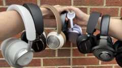 A selection of excellent over-ear headphones, on a red-brick background 