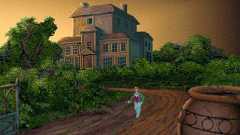 Edward Carnby walks through the manor grounds in Alone in the Dark 1992