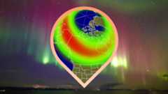 a map showing the possible aurora viewline across the US and where auroras might be visible in 10 states. the background image is a colorful green and magenta aurora stretching like a curtain across the sky.