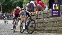 Mathieu van der poel climbs a cobbled hill aboard a Canyon Bike